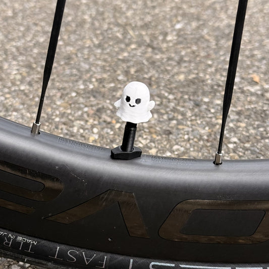 Ghost valve cap on a road bike wheel
